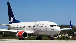 You can find cheap airfare if you know where and when to look. This is a photo of a Scandinavian Airlines plane.