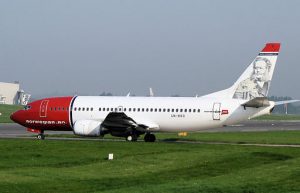 Norwegian Air is hoping their 737s will give them access to new airports. (That's Henrik Ibsen on the tail.)