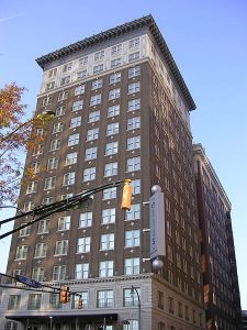 The Ellis Hotel, formerly the Winecoff Hotel, in Atlanta, Georgia. Make sure to follow these important steps when booking a hotel. You can turn a business trip into a vacation here.
