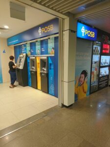 ATMs at Bugis MRT Station in Singapore. ATMs can help you protect your money during international travel.