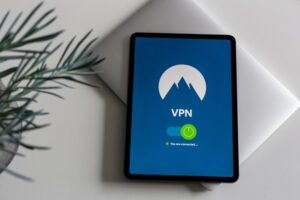 A VPN symbol on a large tablet. A VPN will help you protect your online privacy.