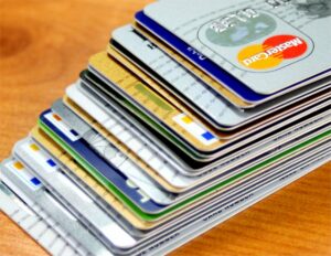 A stack of credit cards. Prepaid credit cards are very useful when you travel.