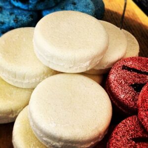 One of our new packing tips is to swap out your shampoo for shampoo bars, like these.