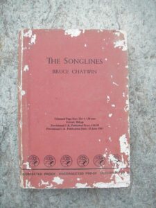 A copy of Bruce Chatwin's "The Songlines," one of our recommended travel books.